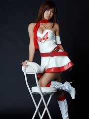 Long haired gravure idol beauty in a tight mini skirt