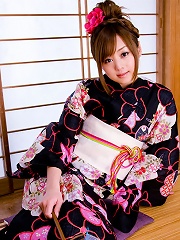 Beautiful gravure idol angel in a cute short dress and boots