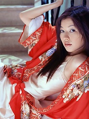Sultry asian babe taunts and teases in her short skimpy dresses