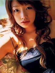 Enticing asian beauty in lingerie shows off her perfect body