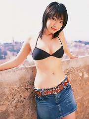 Sensual gravure idol beauty enchants with her perfect body