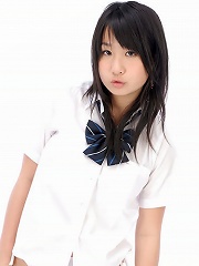 Adorable busty asian school girl lifts up her plaid skirt