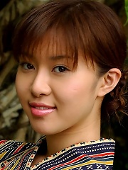 A sexy Japanese girl in a kimono shows off her sexy pale skinned body and hairy Asian pussy