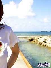 Naughty slut Nana smiles as she shows off her groomed hairy pussy and tight ass