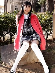Asian slut is waiting in her school girl costume for her next willing customer