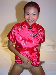 Thai slut with red hair shows her nice boobs and tight pussy