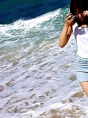 Asian beach bunny shows off her lovely body nude at the beach in the sun