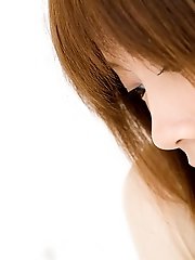 Reika Shiina shy Asian teen shows her hot body in see thru lingerie